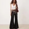 Free People Crinkle Velvet Pleated Wide Leg Trousers In Black For Women