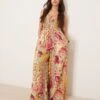 Free People Melrose Printed Wide Leg Jumpsuit In Multi For Women Warm Combo
