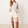 Free People Roselle Ruffled Broderie Mini Skirt In Ivory For Women