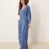 Free People Clara Boho Denim Jumpsuit In Mid Wash Blue For Women Going Steady