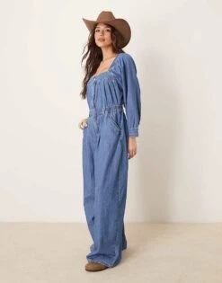 Free People Clara Boho Denim Jumpsuit In Mid Wash Blue For Women Going Steady