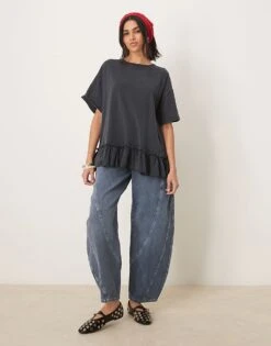 Free People Ruffle Edge Oversized T-shirt Tunic In Washed Black For Women